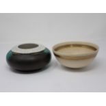 A Studio pottery Bowl in green/black glaze, having three bamboo style canes inserted in to rim and a