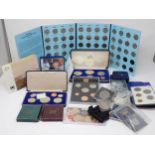 A collection of mainly modern Commemorative Coins to include Barbados 1974 eight coin proof set, a