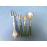 An Edward VII silver Knife, Fork and Spoon with green hardstone handle, Birmingham 1907, and a Bread