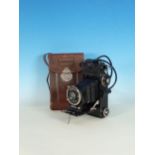 A Voightlander Prominent 6 x 9 folding rollfilm Camera with 105/4.5 Heliar Compur lens extension met