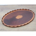 An Edwardian inlaid mahogany two handled Tea Tray with shaped gallery edge, fitted two brass handles