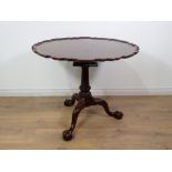 A quality reproduction Pillar table with pie crust top on a turned fluted and carved column and trip