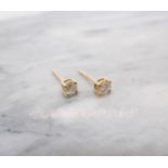 A pair of Diamond Ear Studs each claw-set brilliant-cut stone, total diamond weight 0.40cts, in 18ct