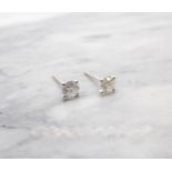 A pair of Diamond Ear Studs each claw-set brilliant-cut stone, total diamond weight 1.26cts, in 18ct