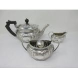 A Victorian silver three-piece Tea Service with gadroon embossing, floral and leafage friezes, Sheff