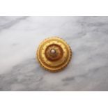 A Victorian Gold Target Brooch with Central Pearl. Approx 33mm d.