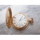 A 14ct gold cased keyless wind Hunter Pocket Watch the white enamel dial with arabic numerals and su