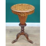A Victorian walnut veneered Trumpet Games and Sewing Table with circular chessboard and floral inaid