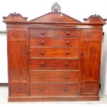 A 19th Century mahogany Gentleman's Secretaire Cabinet having arched pediment, with a hinged pair of