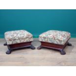 A pair of early 19th Century mahogany square Stools with upholstered tops on four carved paw feet