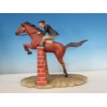 A Capodimonte Figure Group of a Show Jumper with painted mark to base, 30cm H