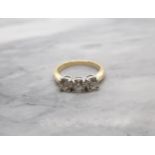 A Diamond three stone Ring claw-set brilliant-cut stones, total diamond weight 1.23cts, in 18ct whit