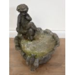 A lead Bird Bath mounted with a cherub and a bird on a shell, bearing the "Bulbeck Foundry" mark 1ft