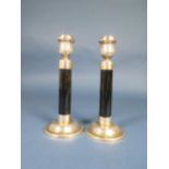 A pair of Mexican silver-gilt and obsidian Candlesticks with leafage sconces and circular bases, 7½