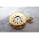 An early 20th Century 18ct gold cased Half-Hunter Pocket Watch the white enamel dial with roman nume