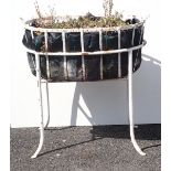 A white painted iron Basket Planter with remnant Oxford Street Label 2ft 8in H x 2ft 6in W