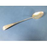 A George IV silver Basting Spoon, Old English pattern engraved initials, London 1821, maker: Eley &