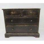 A 19th Century Apprentice Piece stained pine Chest of two short and two long drawers on bracket feet