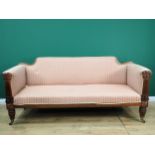 A William IV mahogany Settee with scrolled back, reeded carved arm supports, lobed tapering supports