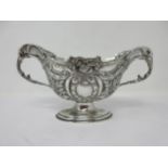 A Victorian silver two-handled Sugar Bowl, floral and leafage decorated on oval pedestal base, Londo