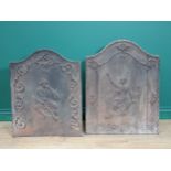 Two antique cast iron Fire Backs with arched top above hunter and huntress with scroll and floral su