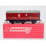 A boxed Hornby-Dublo No.4076 six-wheeled Passenger Brake Van, unused. Model in mint condition with