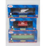 A boxed Lionel 0 gauge Thomas the Tank Engine Series 'Bobber Caboose', 'Gondola with Canisters'