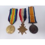 A trio of WWI Medals comprising 1914-15 Star, War and Victory Medals to 1854, PTE J.J. Reed, R.F.A.