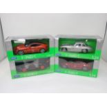 Four boxed Nex Models 1:24 and 1:24-27 scale Models including Aston Martin Vantage, Mercedes-Benz
