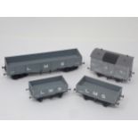 Four Lawrence Goddard 00 gauge scale L.M.S. Wagons
