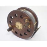 A Slater style wooden star back Fishing Reel