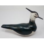 An antique carved and painted Lapwing Decoy