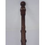 A Papua New Guinea P.N.G. Staff with carved head handle above crocodile and snake 2ft 10in L