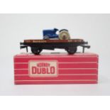 A rare boxed Hornby-Dublo No.4649 Low-sided Wagon with Tractor. Wagon has the tractor with beige