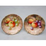 A small pair of Royal Worcester circular Dishes painted still life of fruit, apples and grapes