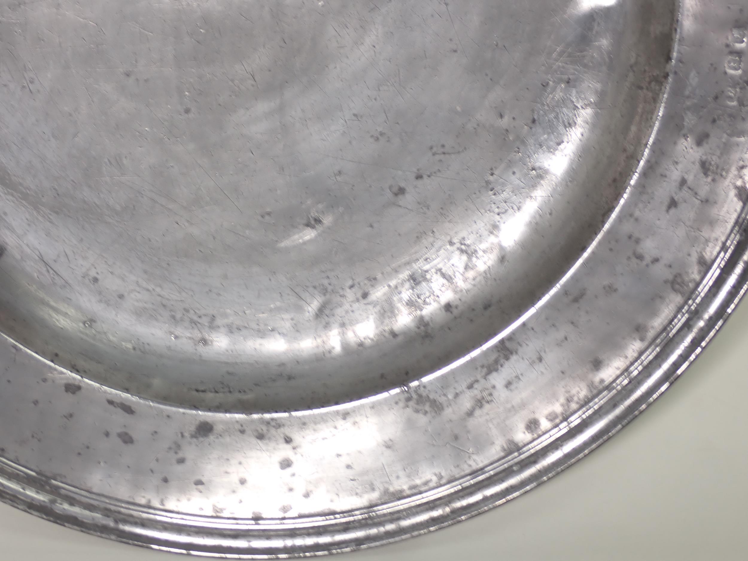 A c.1700 Pewter Charger with touchmarks for John Baskerville, with reeded edge and stamped - Image 2 of 6