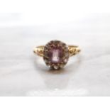 A Victorian Pink Spinel and Diamond Cluster Ring claw-set oval-cut spinel within a frame of old-