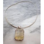 A white metal Torque suspending step-cut landscape agate Pendant