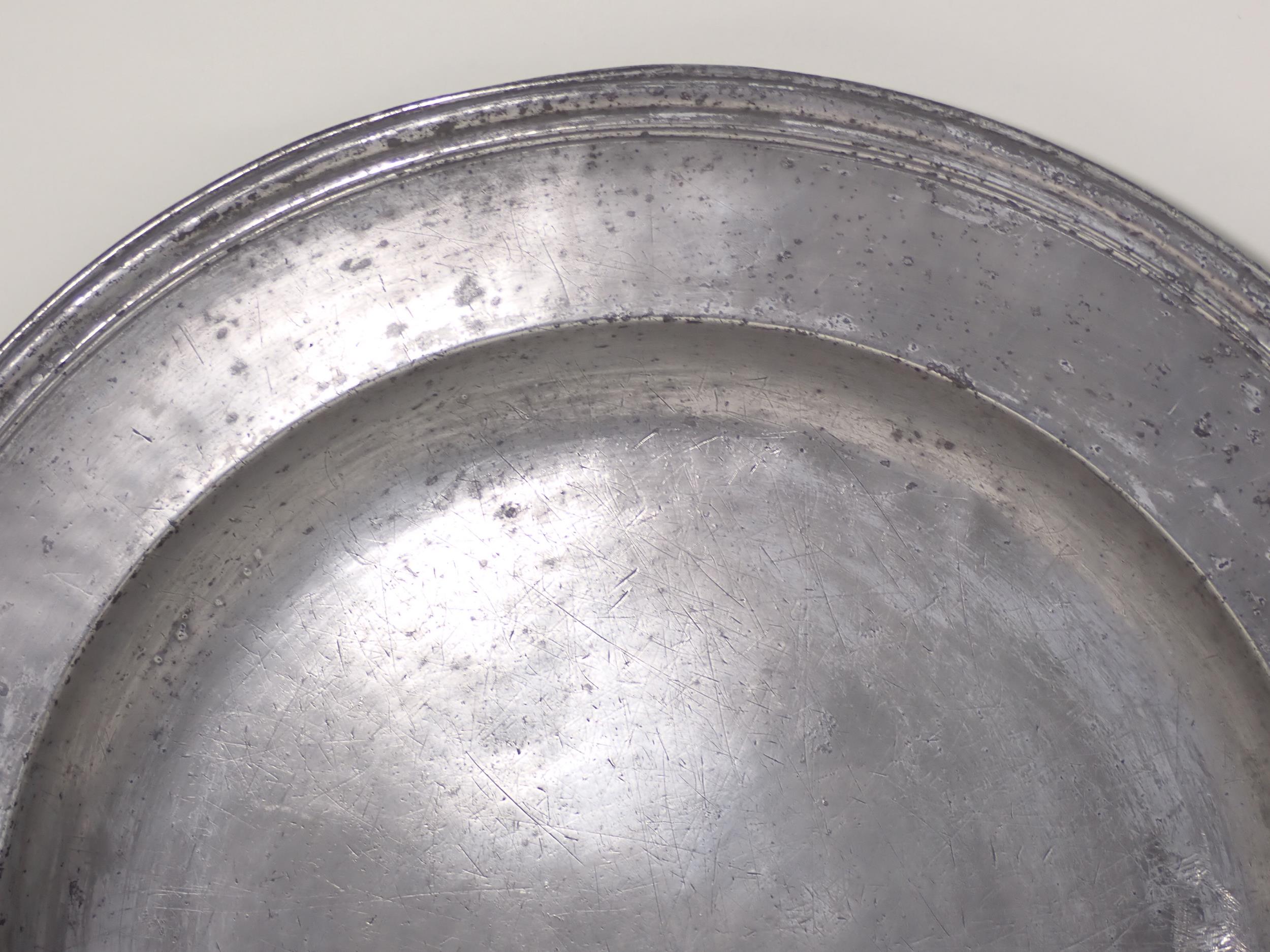 A c.1700 Pewter Charger with touchmarks for John Baskerville, with reeded edge and stamped - Image 3 of 6