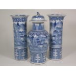 A pair of 19th Century Chinese blue and white Vases of cylindrical form with flared rims and