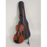 A 7/8ths Violin labelled Antonio Stradivarious, Farrebar with two piece back with bow in case