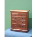 A 19th Century miniature Chest of Drawers with moulded top above two short and three long