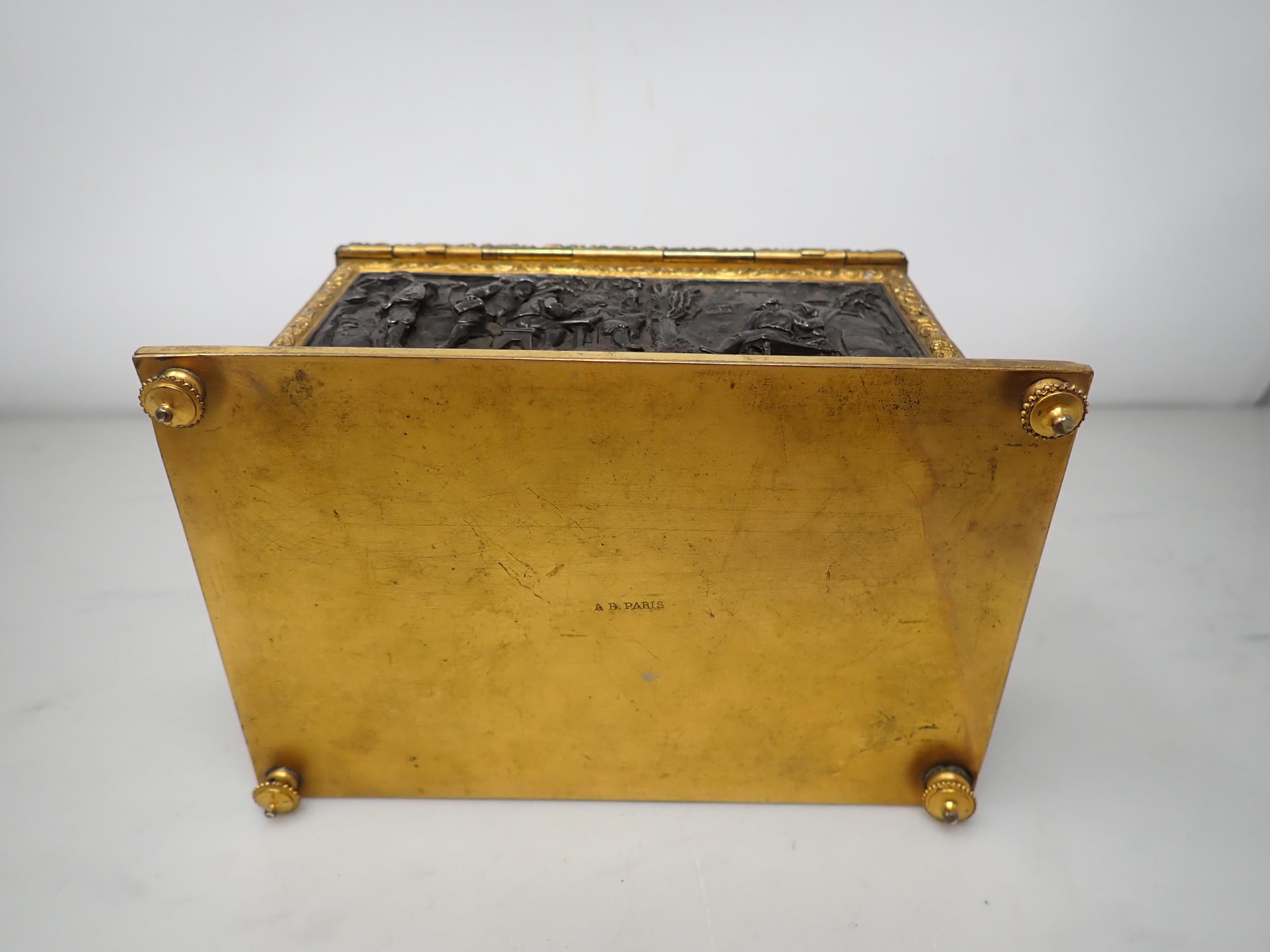 A 19th Century French gilt-metal and bronzed Casket, the inset panels decorated figures merrymaking, - Image 6 of 6