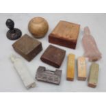 A collection of small Chinese items including three carved wooden Signature Stamps, a child's good