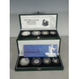 Two Royal Mint Silver Britannia Four Coin Sets, 1997 and 2001, in cases of issue with COA's; (2)