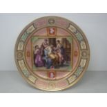 A Royal Vienna handpainted Cabinet Plate with classical scene of maidens and a winged cherub,