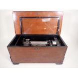 A large late 19th Century Musical Box with six interchangeable cylinders, No 10241, in hardwood case