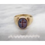 A Seal/Mourning Ring set carnelian carved cross, enclosing lock of hair, stamped 9ct, ring size S