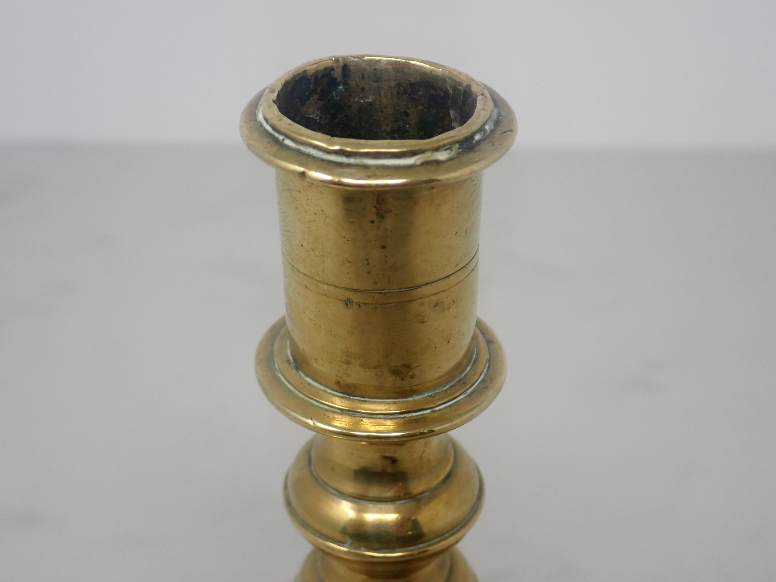 A Georgian brass Candlestick with knopped stem and square base, 5½in H - Image 3 of 6