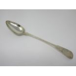 A George IV silver Basting Spoon, fiddle pattern, engraved initial G, Edinburgh 1821, maker: A.H